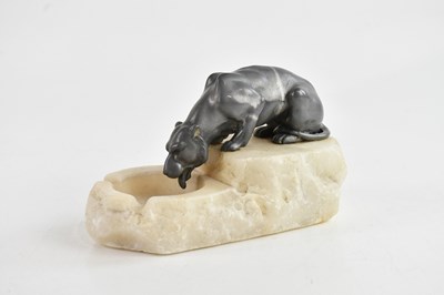 Lot 1180 - An Art Deco silvered spelter and alabaster...