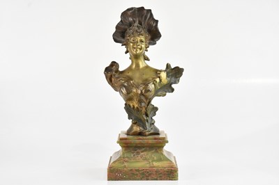 Lot 1174 - An Art Nouveau bronzed spelter bust of a...