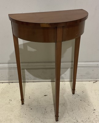 Lot 160 - A reproduction yew wood demi-lune console...