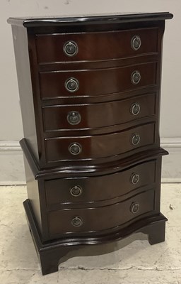 Lot 113 - A reproduction mahogany six drawer serpentine...