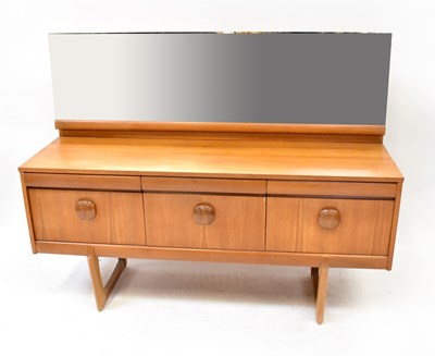 Lot 65 - E. GOMME FOR G-PLAN; a teak mirror back...