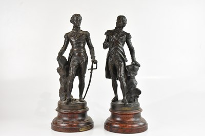 Lot 1337 - A pair of spelter figure, bearing plaques...