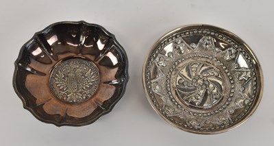 Lot 1182 - A circular white metal 900 grade pin dish,...