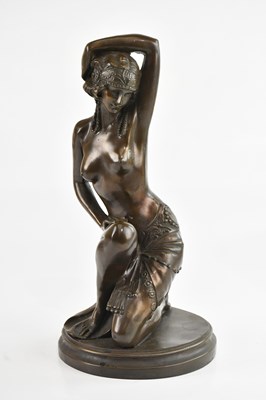 Lot 1339 - A decorative bronzed figure of a nude female,...