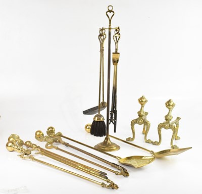 Lot 1342 - A brass companion set and further fire irons,...