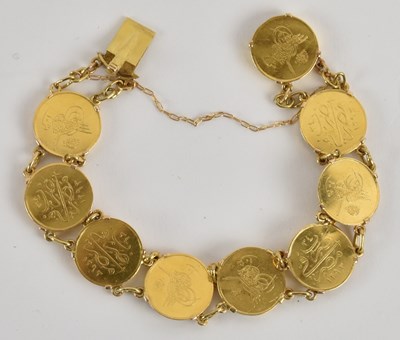 Lot 1402 - A Middle Eastern/Arabic yellow metal bracelet...