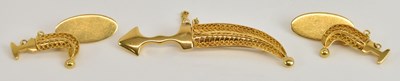 Lot 1384 - A yellow metal brooch modelled as a Persian...