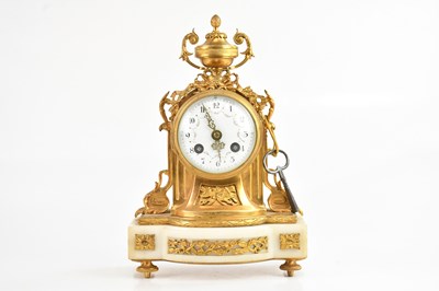 Lot 1268 - A late 19th century French gilt metal mantel...