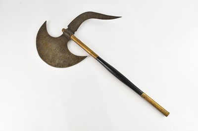 Lot 505 - A reproduction Eastern war axe, 70cm.