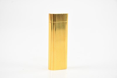 Lot 1434 - CARTIER; a gold plated 'Briquet' lighter,...