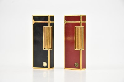 Lot 1436 - DUNHILL; a red laquer and a black laquer...