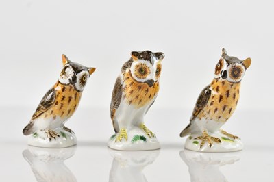 Lot 1087 - MEISSEN; three porcelain models of owls,...