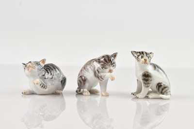 Lot 1088 - MEISSEN; three miniature models of cats,...