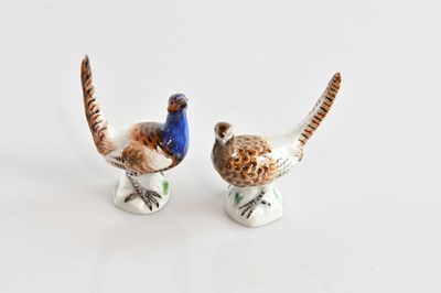 Lot 174 - MEISSEN; two miniature porcelain models of a...