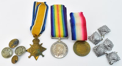 Lot 354 - A WWI medal trio awarded to Pte. T. W. Catlow,...