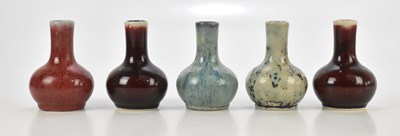 Lot 1183 - COBRIDGE STONEWARE; five bottle vases, each...