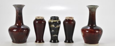 Lot 1187 - COBRIDGE STONEWARE; five vases decorated with...