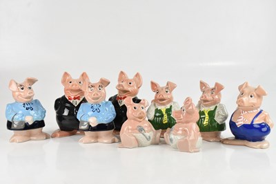 Lot 1041 - WADE; a collection of nine Nat West pig money...