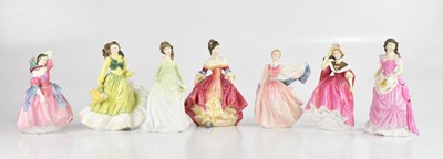Lot 1164 - ROYAL DOULTON; seven assorted figures,...
