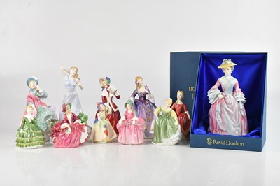 Lot 1127 - ROYAL DOULTON; eleven assorted figures,...