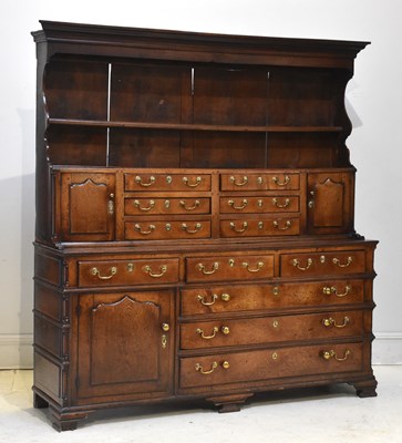 Lot 1042 - A George III oak high back dresser, possibly...