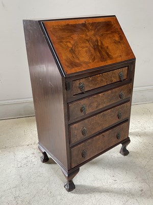 Lot 1153 - A 1920s walnut lady's writing bureau, with...