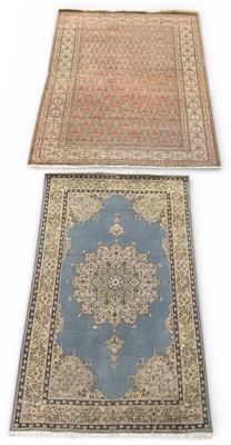 Lot 83 - A modern Persian style geometric carpet, with...