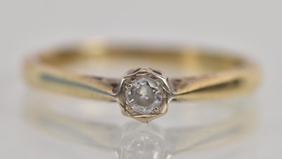 Lot 1269 - A 9ct yellow gold diamond solitaire ring, the...