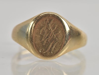 Lot 1256 - A 9ct yellow gold signet ring (cut), approx 4.3g.