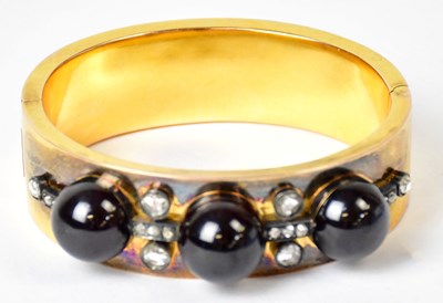 Lot 699 - A circa 1900 French gold hinged bracelet set...