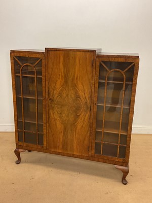 Lot 479 - An Art Deco walnut veneered glazed display...