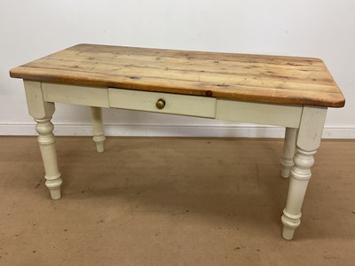 Lot 475 - A pine farmhouse table with a single drawer,...