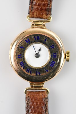 Lot 1097 - A 9ct gold trench style watch, the half hunter...