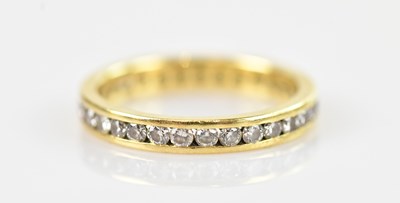 Lot 498 - An 18ct hallmarked yellow gold full eternity...