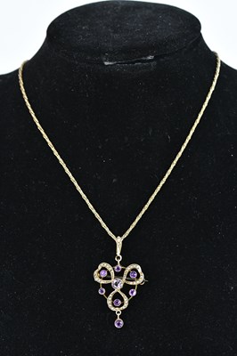 Lot 379 - An Edwardian 9ct yellow gold Art Nouveau style...