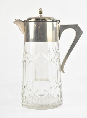 Lot 346 - A large decorative cut glass flagon with...