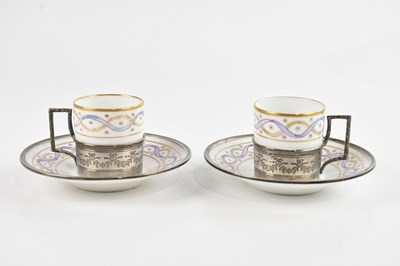 Lot 315 - SEVRES; a pair of porcelain coffee cans and...