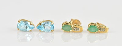 Lot 267 - A pair of yellow metal ear studs set with a...