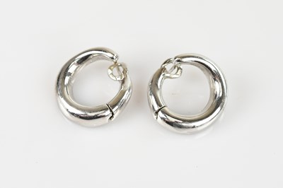 Lot 258 - A pair of 9ct white gold ear studs of circular...