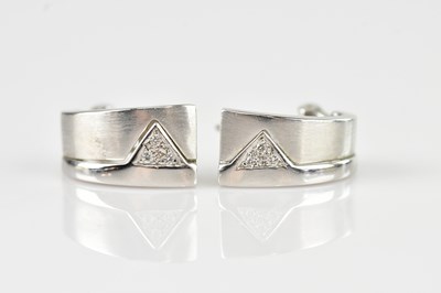 Lot 240 - A pair of 18ct white gold diamond set...
