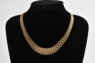 Lot 304 - A 9ct yellow gold fringed necklace, length...