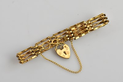Lot 128 - A 9ct yellow gold gate link bracelet with...