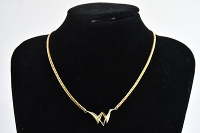 Lot 332 - A 9ct yellow and white gold necklace with...