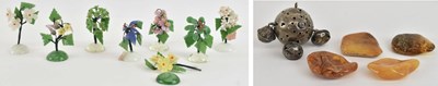 Lot 543 - Four loose rough cut amber pieces, the largest...