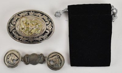 Lot 335 - A vintage oval white metal Western cowboy belt...