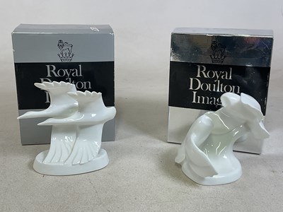 Lot 176 - ROYAL DOULTON; two white porcelain figures in...