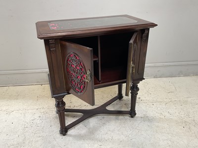 Lot 1117 - An early 20th century walnut music cabinet,...