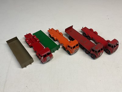 Lot 72 - DINKY; four Foden flatbed trucks, two in the...