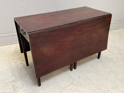 Lot 1161 - An early 19th century mahogany drop-leaf table,...