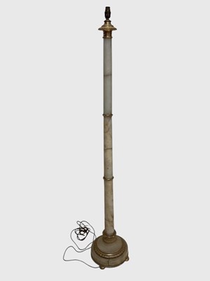 Lot 1314 - An alabaster standard lamp, height 154cm.